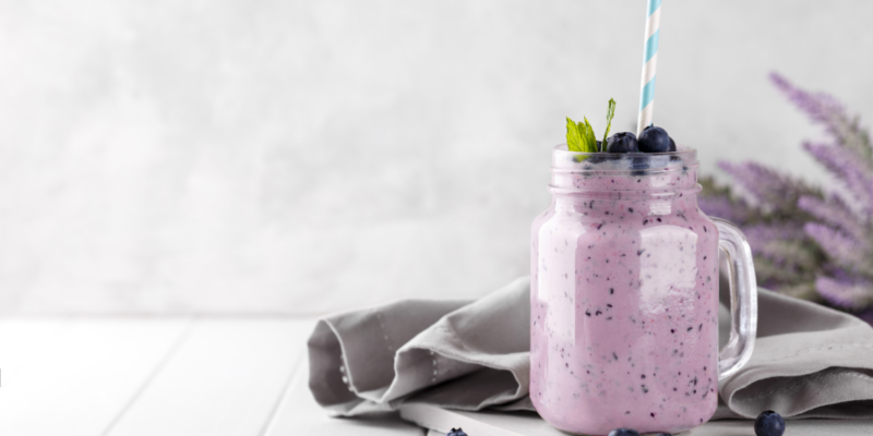 mason jar with fruit smoothie