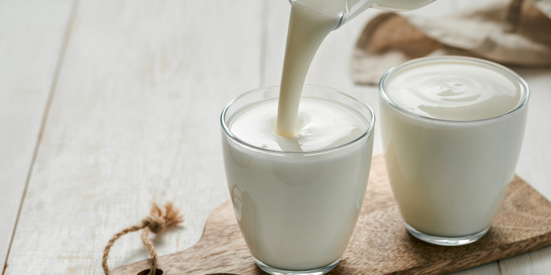 Kefir being poured into glass