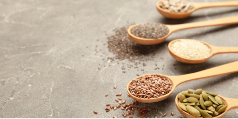 seeds in wooden spoons